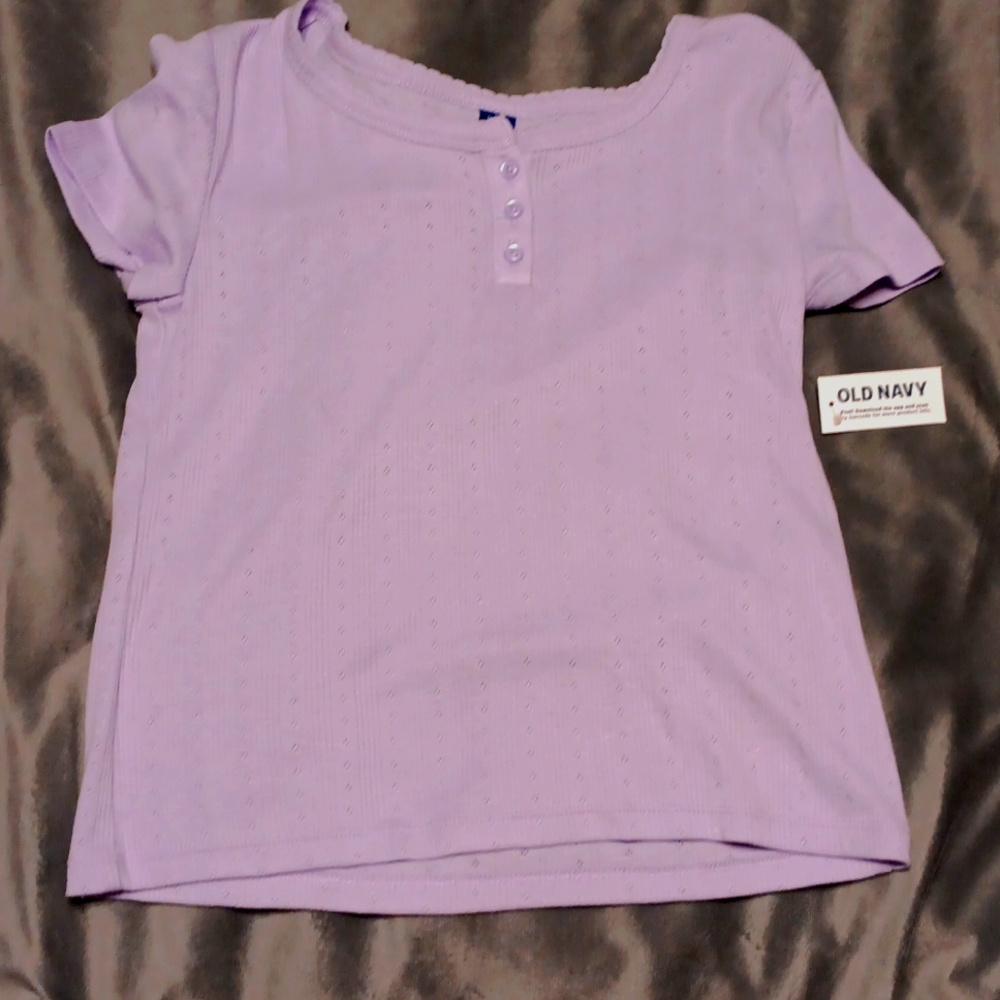 A lilac tight fitting shirt from Old Navy, new with tags. Size 11/12